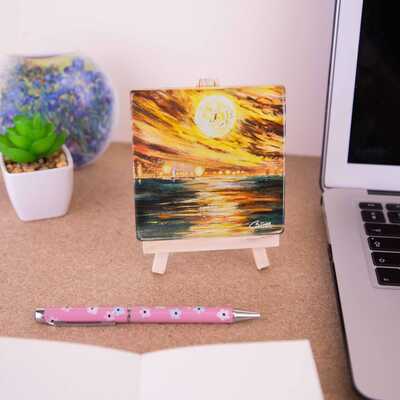 Glass coaster on a mini easel of the painting 'Full power - nature wins'