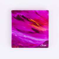 Glass coaster of Moorland vale - a purple sky and moorland with an orange sun peering through